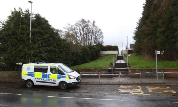 Police have cordoned off a flight of steps connecting Mackay Road to Culduthel Road