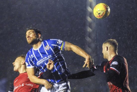 Cowdenbeath's Craig Barr and Elgin's Russell Dingwall