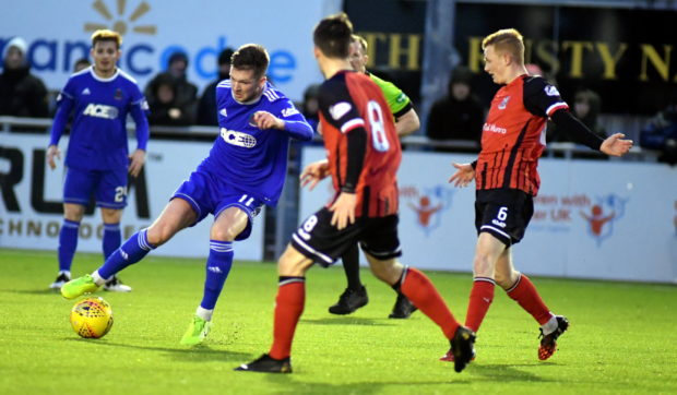 Cove Rangers midfielder Jamie Masson in action against Elgin City.