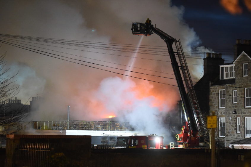 Flames erupting from the property in Aberdeen.