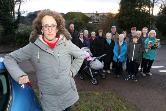 Helen Baillot and other concerned residents of Mackay Terrace in Avoch who fear O2 is preparing to install a large mast on their street.