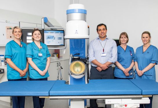 From left: Laura Slater(lithotripsy lead radiographer), Catriona MacGillivray (lithotripsy specialist radiographer),  Ismail Mokadem, (consultant urologist), Jackie Reid (staff nurse) and Lynn Rankin (staff nurse)