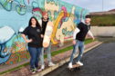 Pictured are from left Broch Skate Club Chairwoman Anneka Niro, Jonny Kennedy of Brewdog and club committee member Nathan Morrison  
Picture by DARRELL BENNS    
Pictured on 04/12/2019