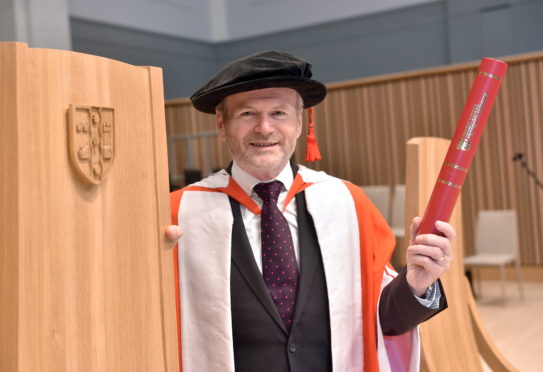 RGU Winter Graduations at Music Hall, Aberdeen
Pictured is Honorary Graduation Dave Mackay, Honorary Doctor of Technology The first ever Scottish-born astronaut will be further celebrated with an honorary degree from Robert Gordon University (RGU) for his ambitious ascent through the Royal Air Force ranks and his inspiring expedition beyond our Earths atmosphere. 
Picture by DARRELL BENNS 
Pictured on 11/12/2019   
CR0014966