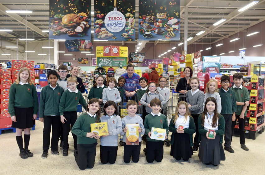 Pictured are from left, Alice Connell, 9, Abby Clark, 9, Zayyan Baig, 9 and Emma Arteaga, 9. Pupils at the supermarket sweep