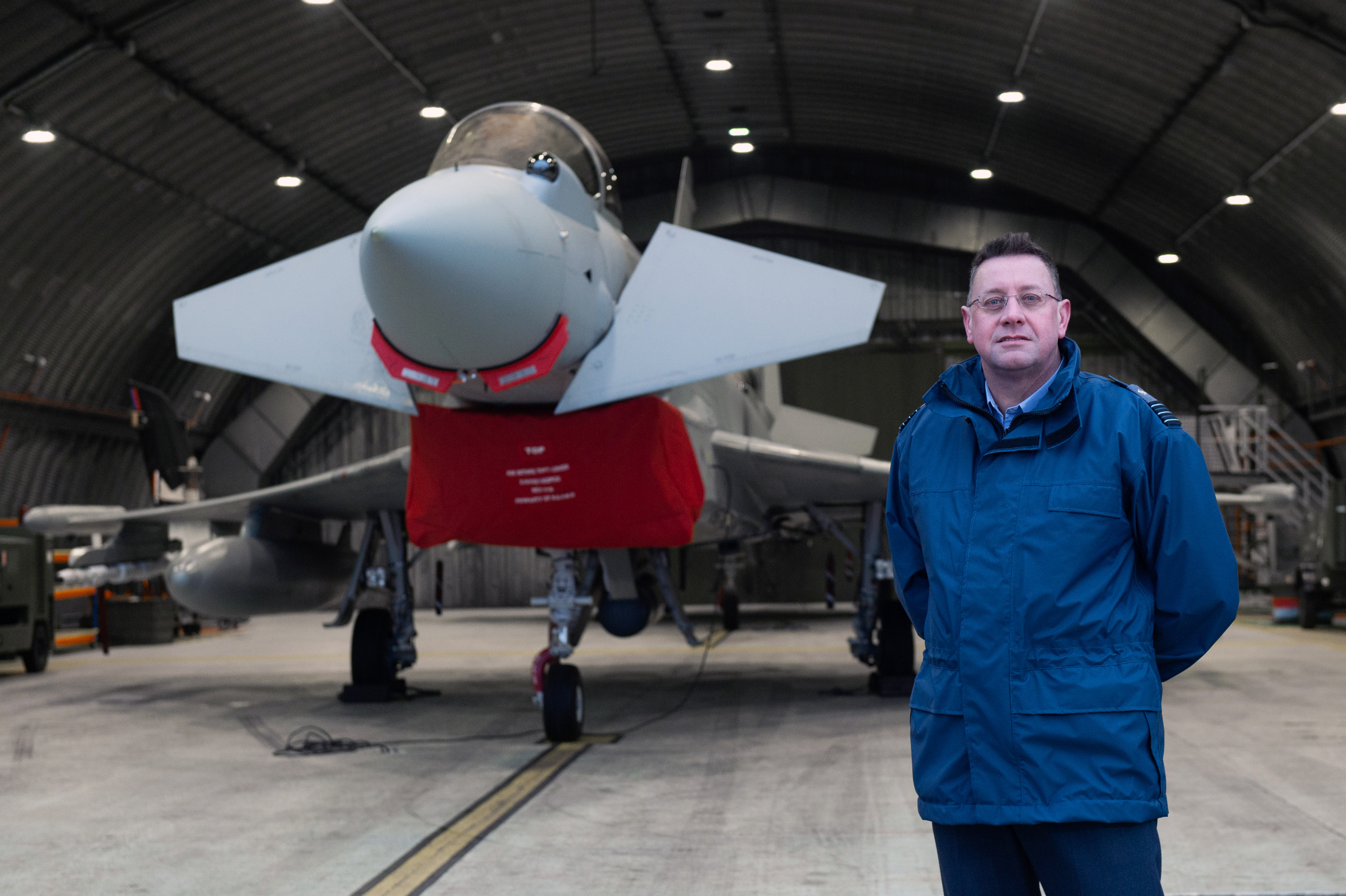 Pictures by JASON HEDGES
URN: CR0017235  
Pictures show RAF Lossiemouth and the QRA facility at the base.
Picture: Senior Chaplin, Wing Commander Rev. Colin Weir is pictured at an armoured shelter with an RAF Typhoon in the background.
Pictures by JASON HEDGES