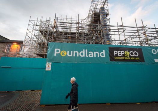 Work on the Poundland building in Elgin is having a profound impact on the way traffic moves around the town centre. Image: Jason Hedges/DC Thomson