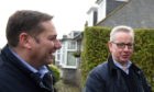 MIchael Gove  at centre door knocking in the Aberdeen South Constituency. with Candidate Douglas Lumsdon on his left and house occupier Richard Stephen

Picture by Paul Glendell