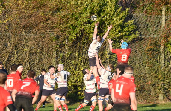 Robin Cresford gets the ball during a line out.
Picture by Paul Glendell