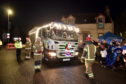 The Ellon Christmas Lights switch-on parade.


Picture by Scott Baxter