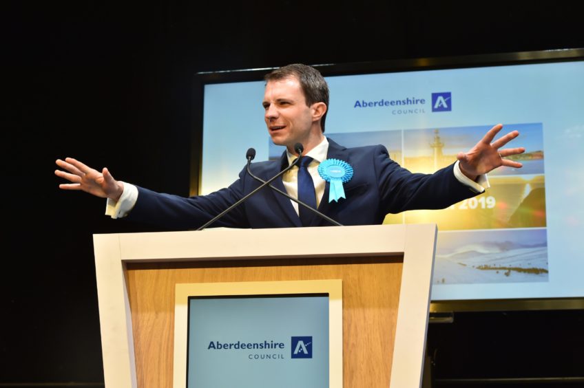Conservatives Andrew Bowie celebrates retaining his seat for West Aberdeenshire and Kincardine at P&J Live, Aberdeen. Picture by Kenny Elrick