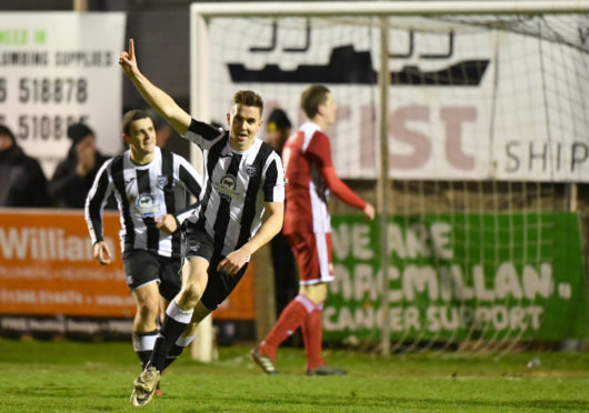 Paul Campbell celebrates scoring.