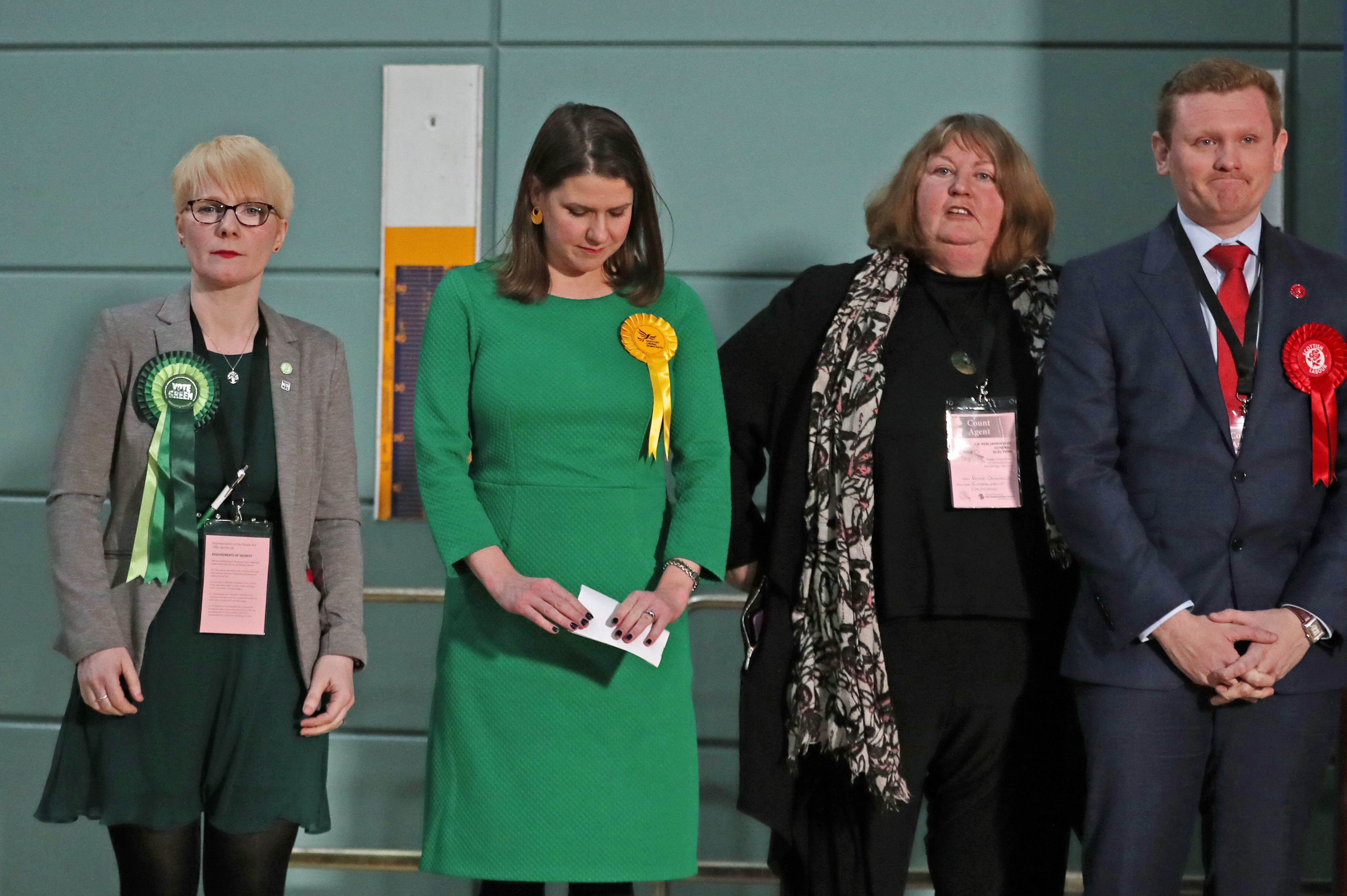 Lib Dem leader Jo Swinson (second left) listens as she loses her East Dumbartonshire constituency in the 2019 General Election, during the count at the Leisuredome, Bishopbriggs.
