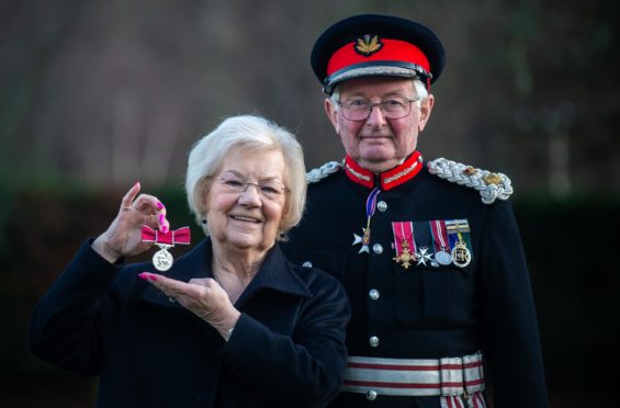 The Lord-Lieutenant of Moray, Grenville Johnston gives June Herron her BEM