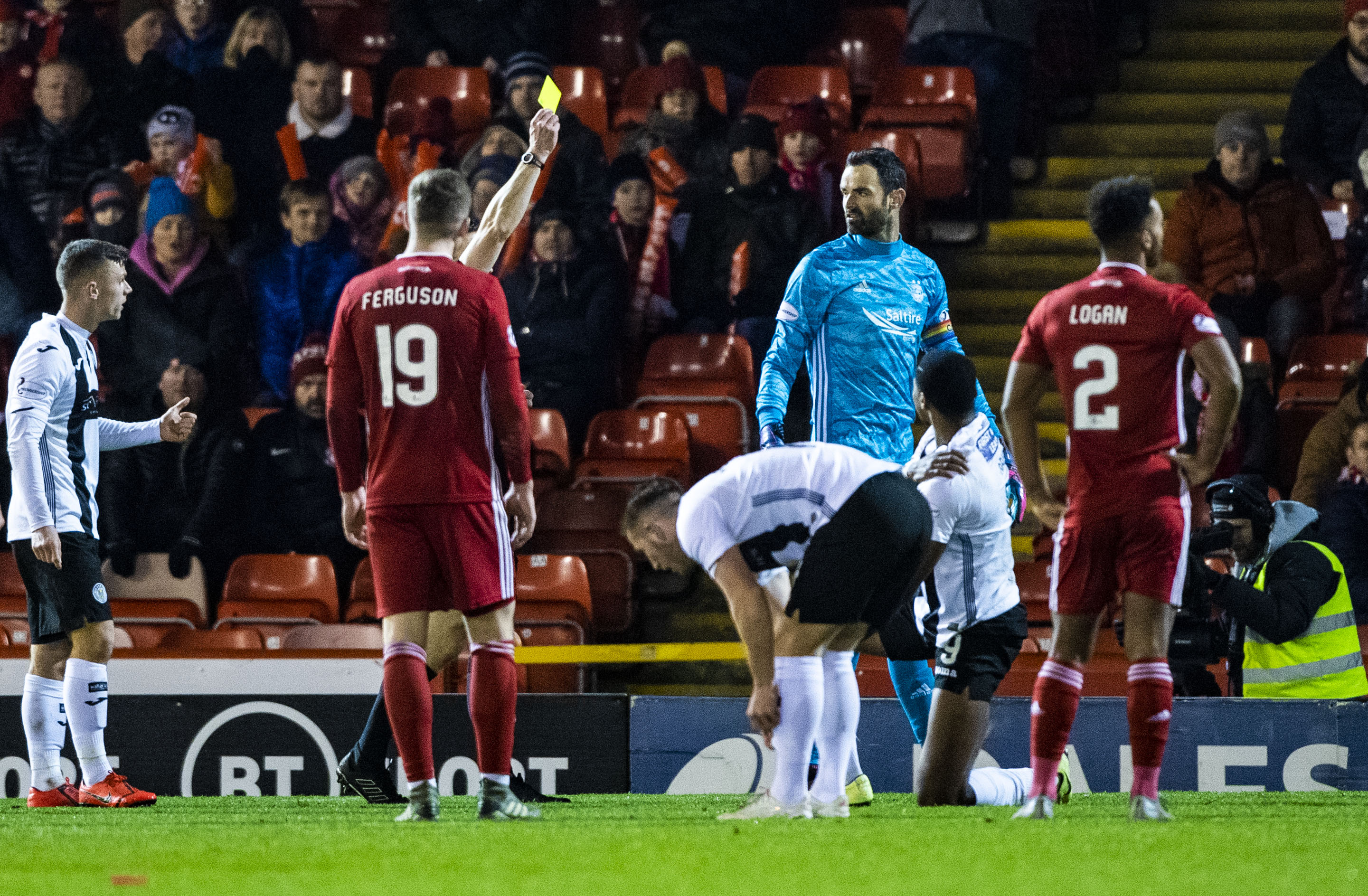 Aberdeen's Joe Lewis is booked by referee Steven McLean during the Ladbrokes Premiership match between Aberdeen and St Mirren at Pittodrie.