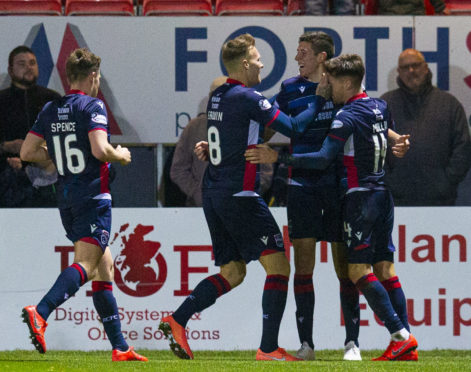 Ross Stewart is congratulated by team-mates after scoring against Hibernian.