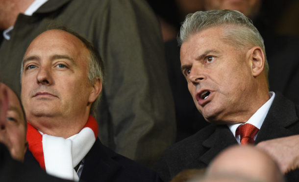 Aberdeen chairman Dave Cormack, right, and Atlanta United president Darren Eales watch on.