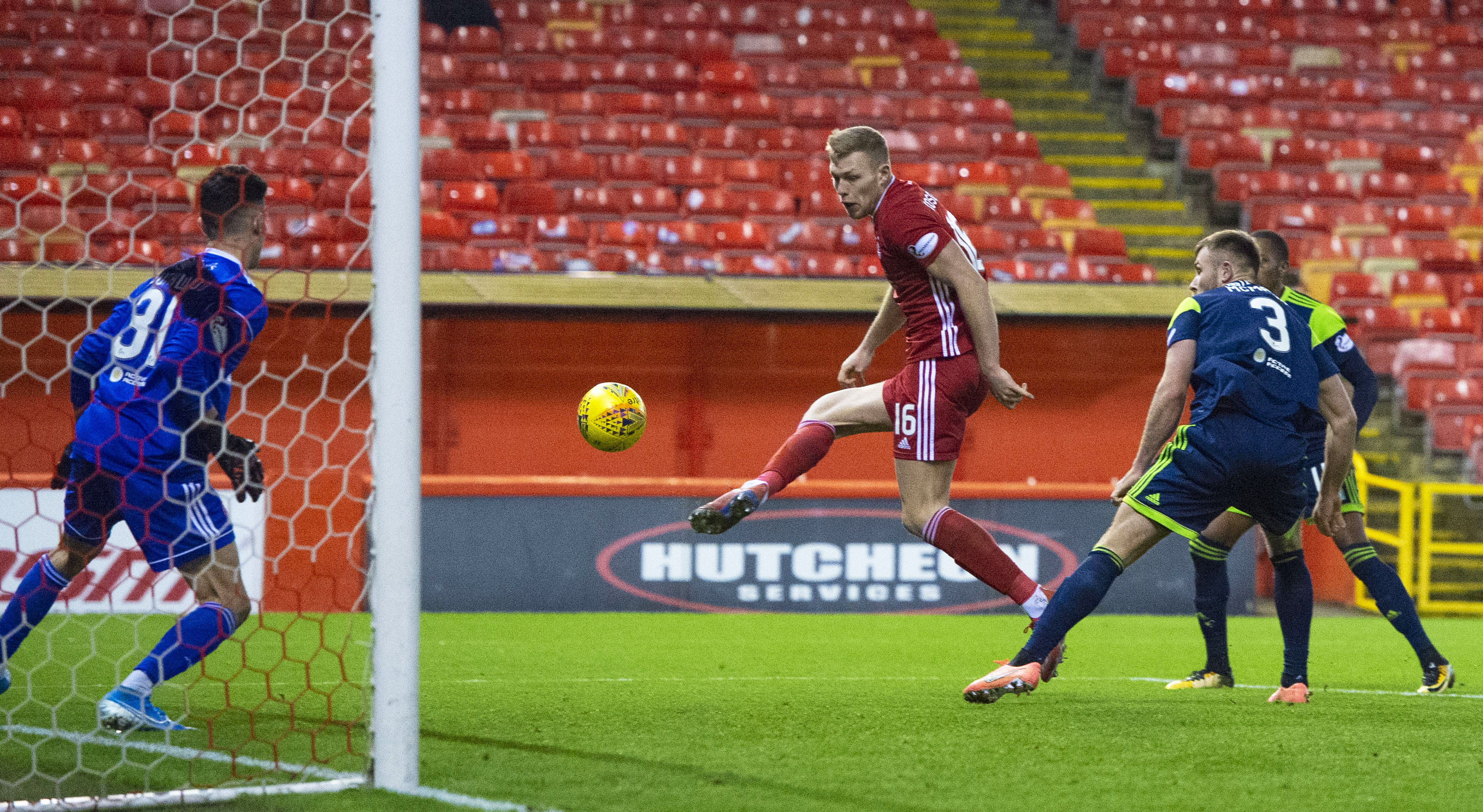 Sam Cosgrove volleys in at the back post for Aberdeen against Hamilton.