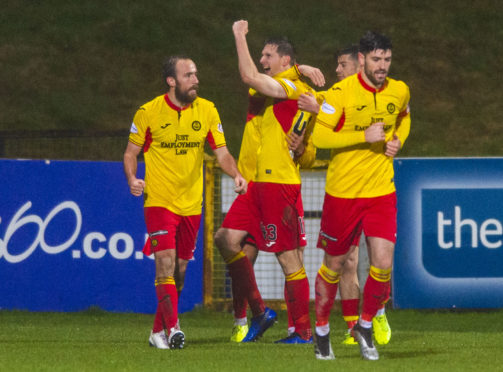 Partick Thistle's Steven Saunders celebrates making it 2-1.