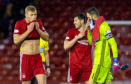 Sam Cosgrove, Scott McKenna and Joe Lewis at full time during the Ladbrokes Premiership match between Aberdeen and Hamilton.