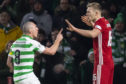 Celtic's Scott Brown and Aberdeen's Sam Cosgrove exchange words.