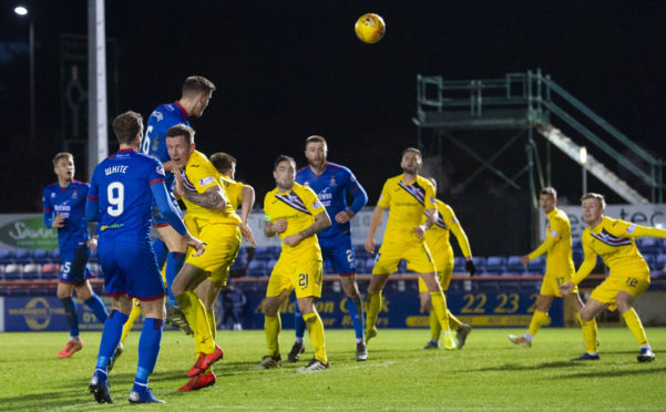 Inverness' Jamie McCart rises to head in the second goal during the Ladbrokes Championship match with Dunfermline Athletic.