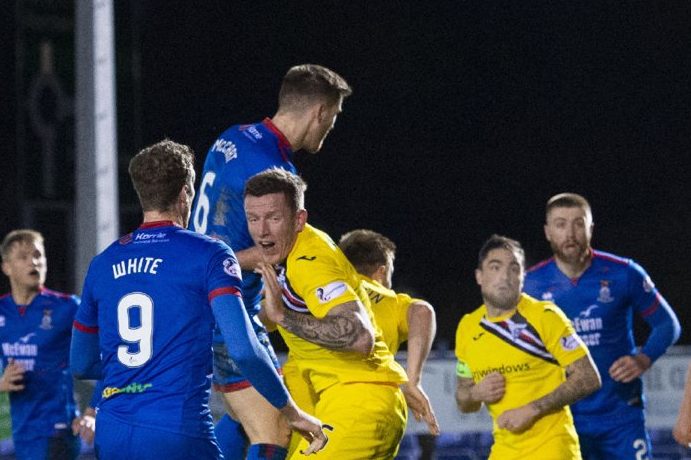 Inverness's Jamie McCart (6) rises to head in the second goal during a Ladbrokes Championship match between Inverness Caledonian Thistle and Dunfermline Athletic