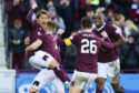 Ryotaro Meshino celebrates with his teammates after making it 1-0 to Hearts during the Ladbrokes Premiership match between Hearts and Aberdeen, at Tynecastle Park, on December 29.