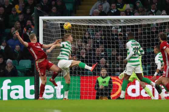 Aberdeen's Sam Cosgrove (left) scores the equaliser at Celtic Park