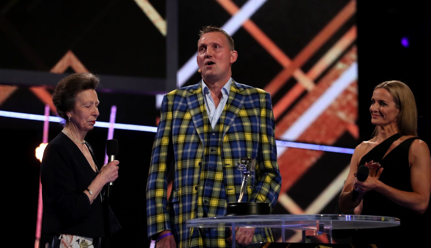 Doddie Weir (centre) receives the Helen Rollason Award from The Princess Royal during the BBC Sports Personality of the Year 2019 at The P&J Live, Aberdeen. PA Photo. Picture date: Sunday December 15, 2019. See PA story SPORT Personality. Photo credit should read: Jane Barlow/PA Wire.