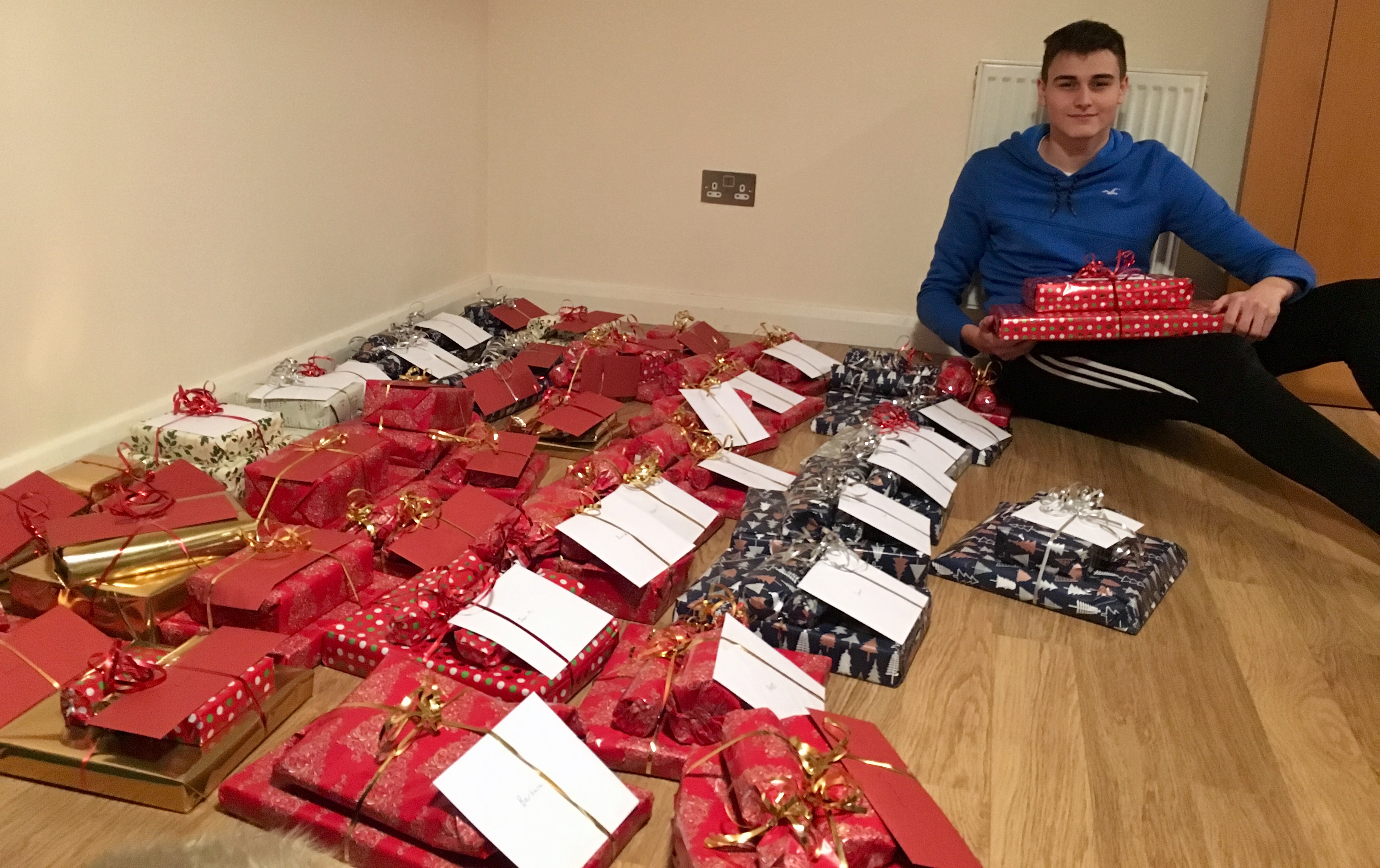 Stevan Spanovic with the presents he will give out on Christmas Day