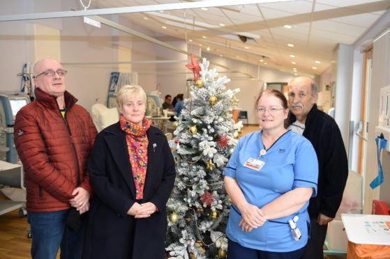 Pictured are Stuart Hunter, Isabelle Sutherland, and Angus Simpson from Unite and Renal Nurse Diane Drysder