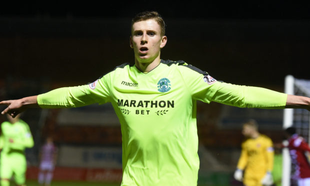 Oli Shaw celebrates netting for Hibernian.