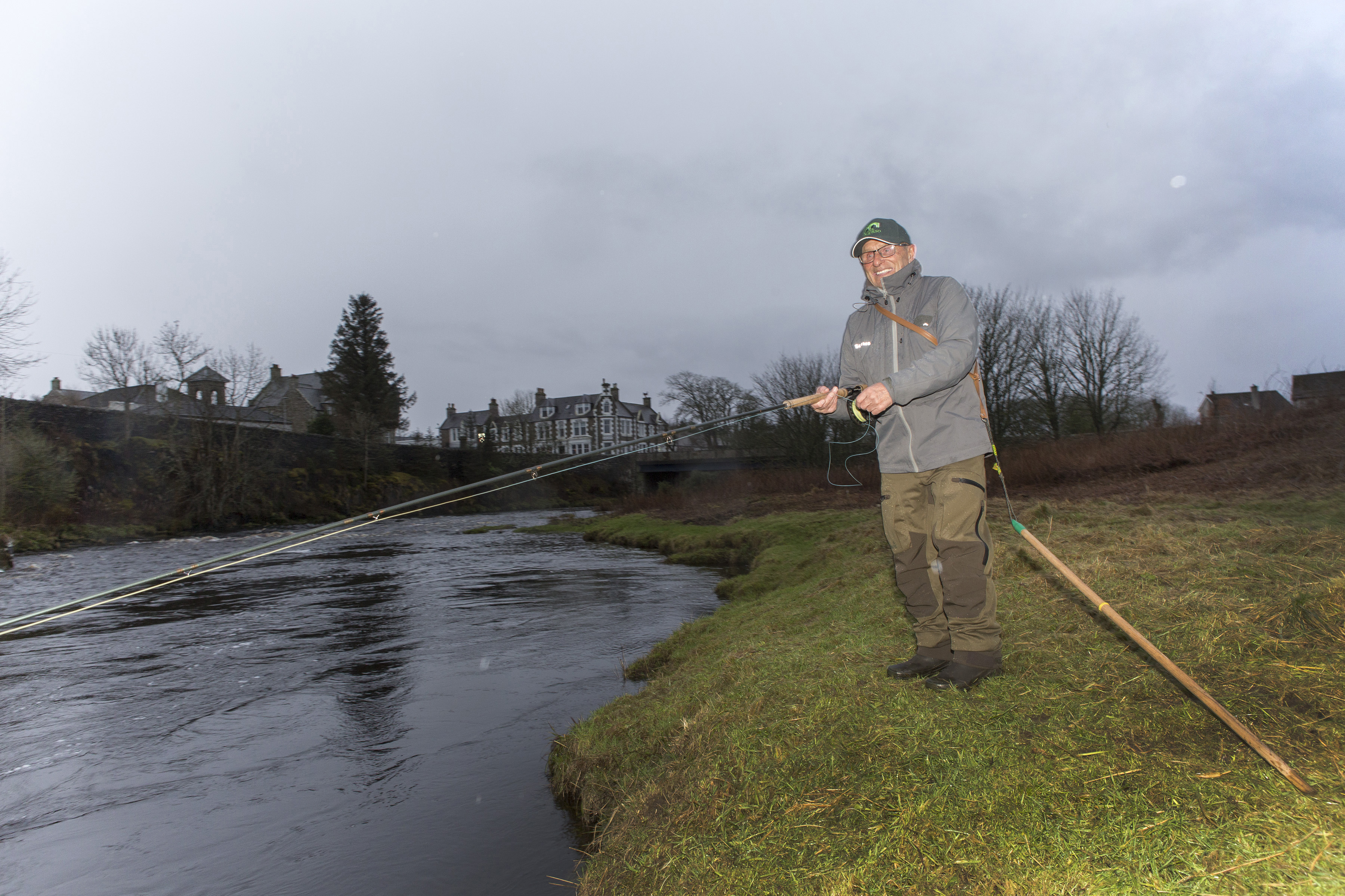 Freddie Sutherland, from Uddingston, casts the first fly of the new salmon season, on Thurso River.