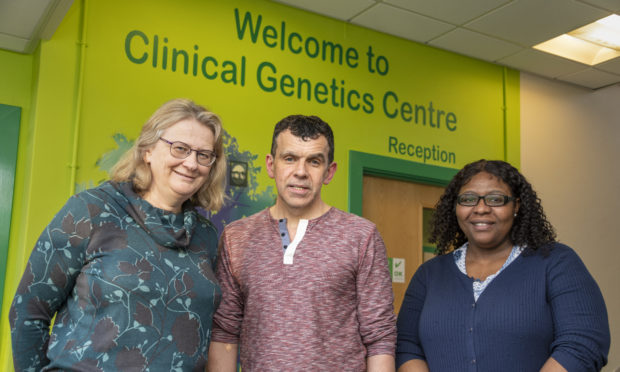 Sandy Patience, middle, visits Aberdeen every two months to have fluid taken from his brain for analysis along with the administration of either the trial drug or a placebo