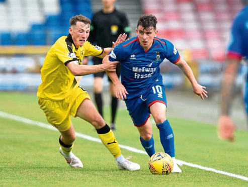 Inverness's Aaron Doran in action with Raith Rovers' Regan Hendry