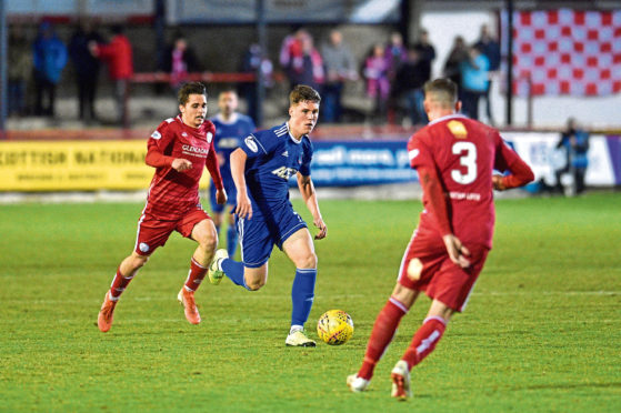 Josh Mulligan in action for Cove