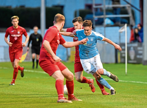 Scott Davidson in action for Nairn County.