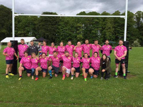 Members of the Turriff Rugby Football Club Mens and Ladies teams.