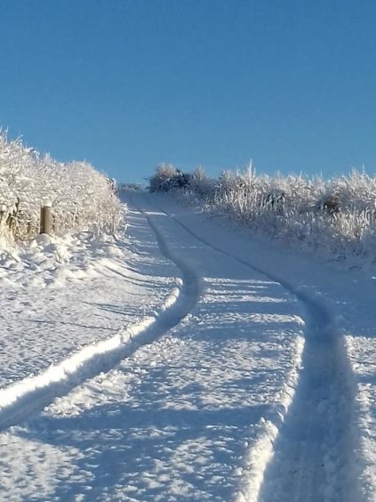 Hazel Law shared a picture of the snowfall on her driveway in Dufftown on social media.