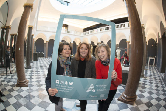 Student Ceilidh Jeffrey (centre) with Councillor Marie Boulton and museums manager Christine Rew,