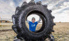 Cameron Hook trains with his tractor tyre which he will be flipping right the way to the top of Ben Bhraggie. He is raising funds for The Butterfly Trust in aid of Cystic Fibrosis Support Scotland and Dornoch City FC.