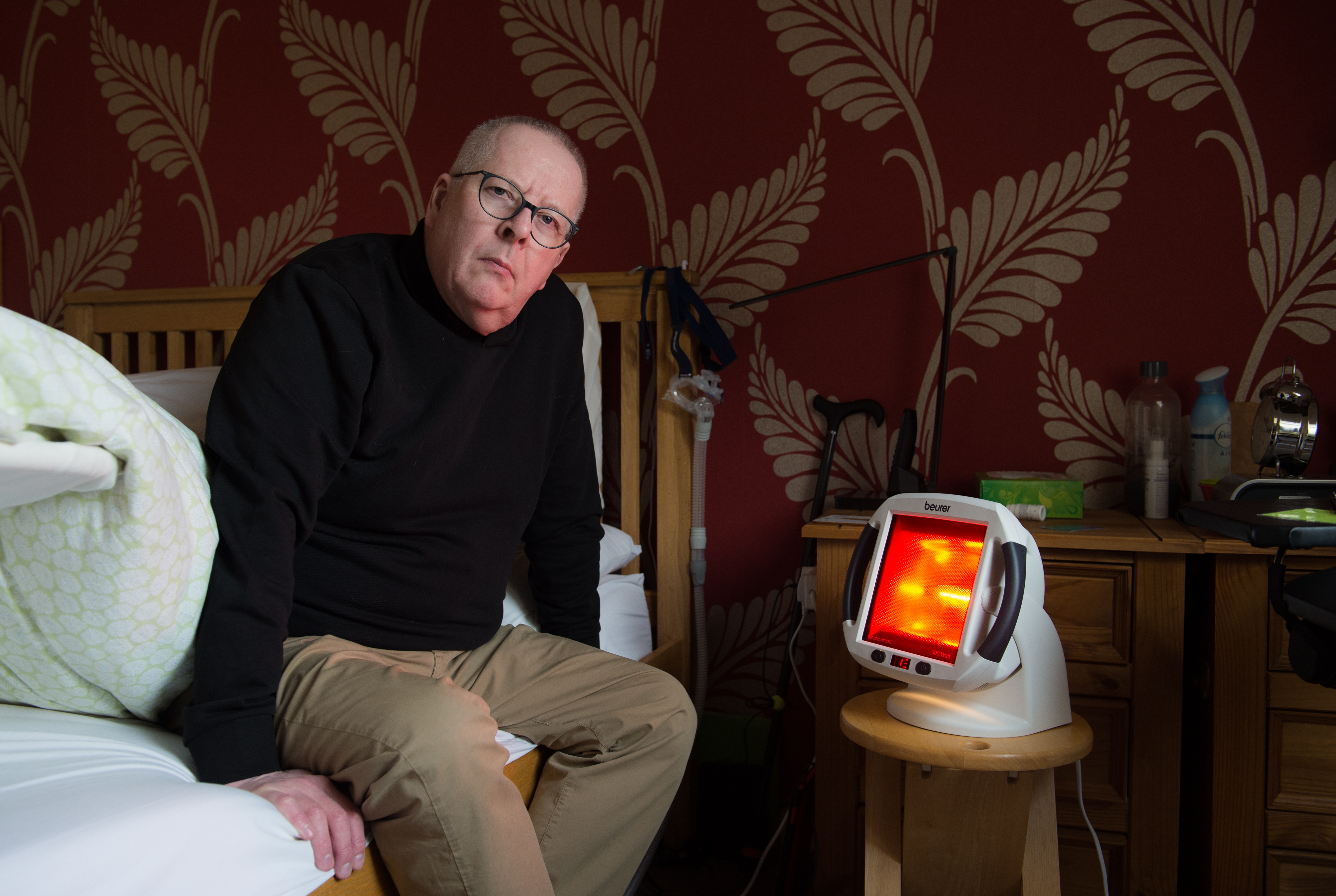 Chris Bridgeford, chairman of Affa Sair chronic pain campaign group, at his Forres home. Picture by Jason Hedges.