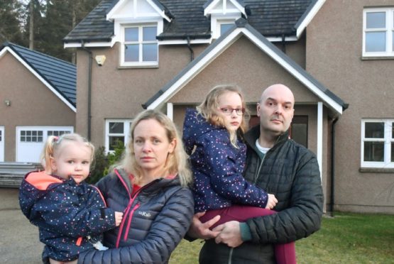 Dan Harcombe pictured with his wife Therese and children, Alice  and Emily. Picture by Chris Sumner.