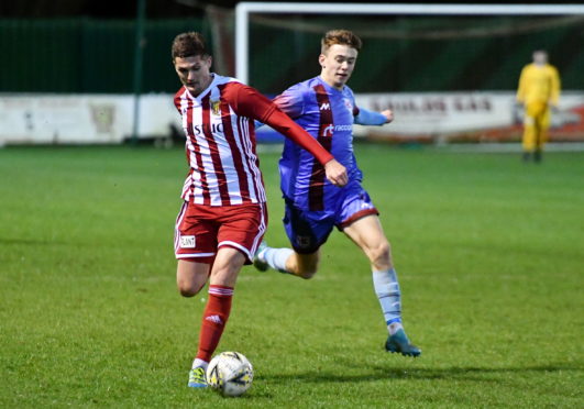 Formartine's Daniel Park and Keith's Andrew Smith.
Picture by Chris Sumner