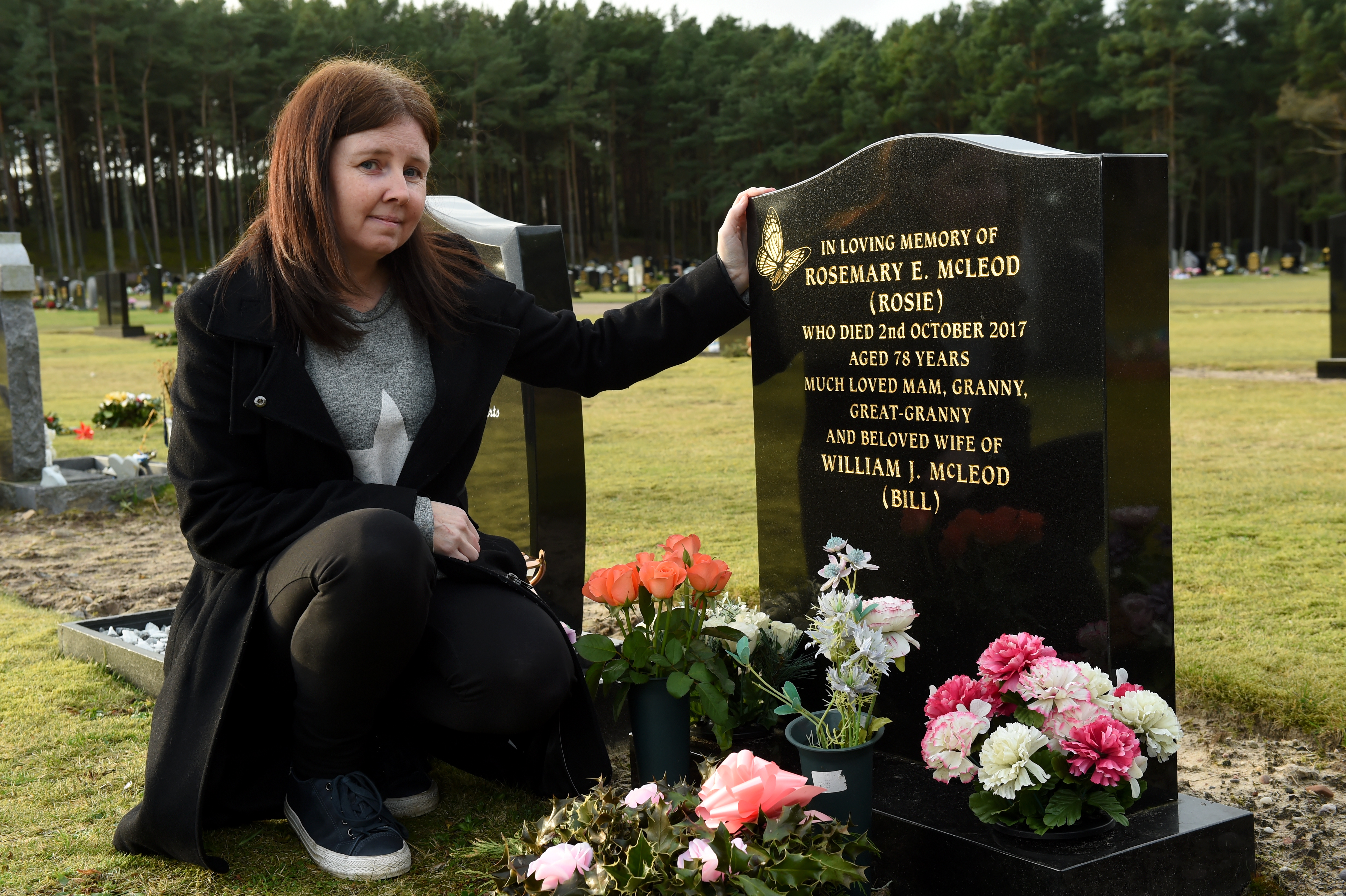 Lyndsay Broadley at her grandmother's grave in Lossiemouth.