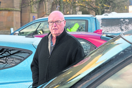 Councillor Jim MacGillivray of Highland Council photographed in Dornoch Square where the council are proposing to introduce parking charges.
Picture by Sandy McCook