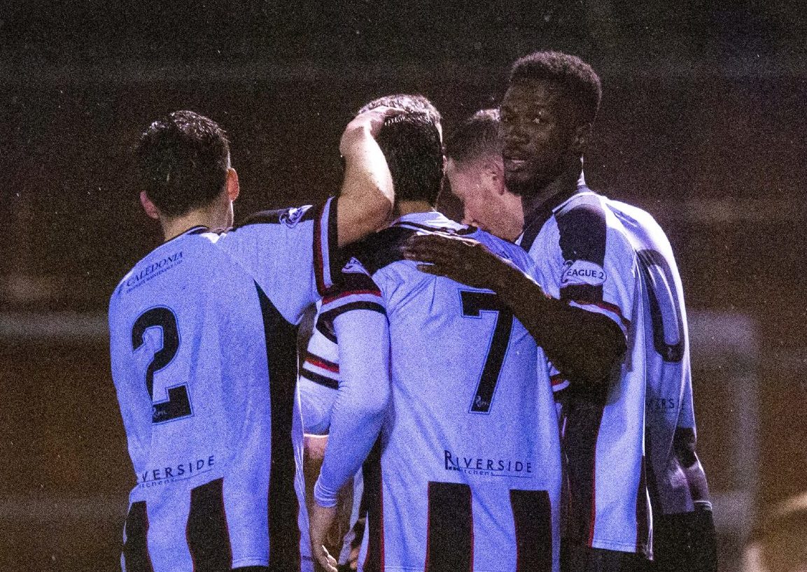 Elgin come together to celebrate Rabin Omar's goal during the Ladbrokes League Two match between Annan Athletic and Elgin City