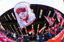 Aberdeen fans get behind their team at the Scottish Cup tie against Dumbarton in January.