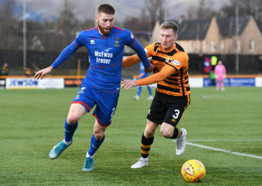 Shaun Rooney (left) competes with Liam Dick during the William Hill Scottish Cup fourth round match between Alloa Athletic and Caley Thistle